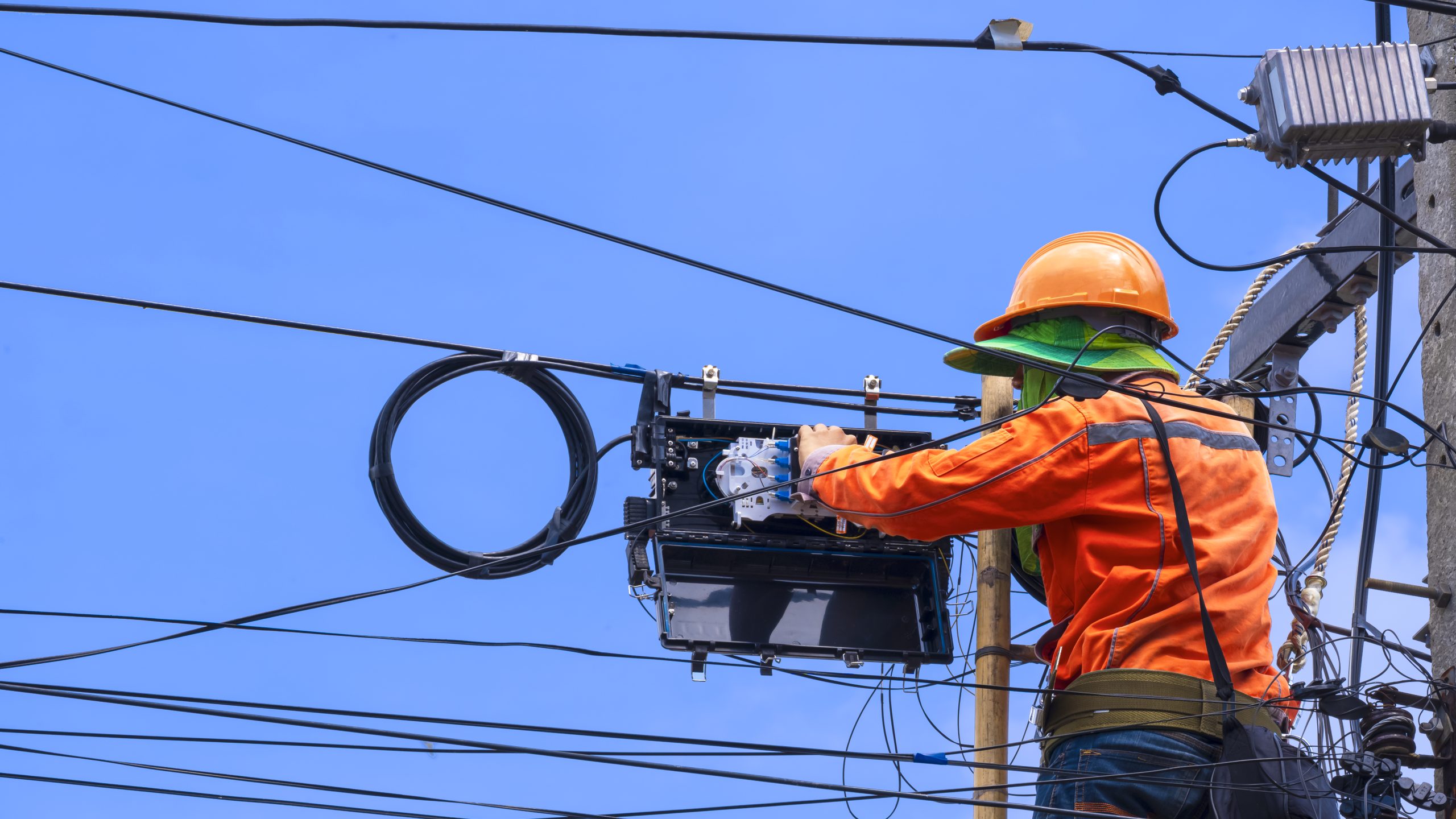 technician working on communication lines